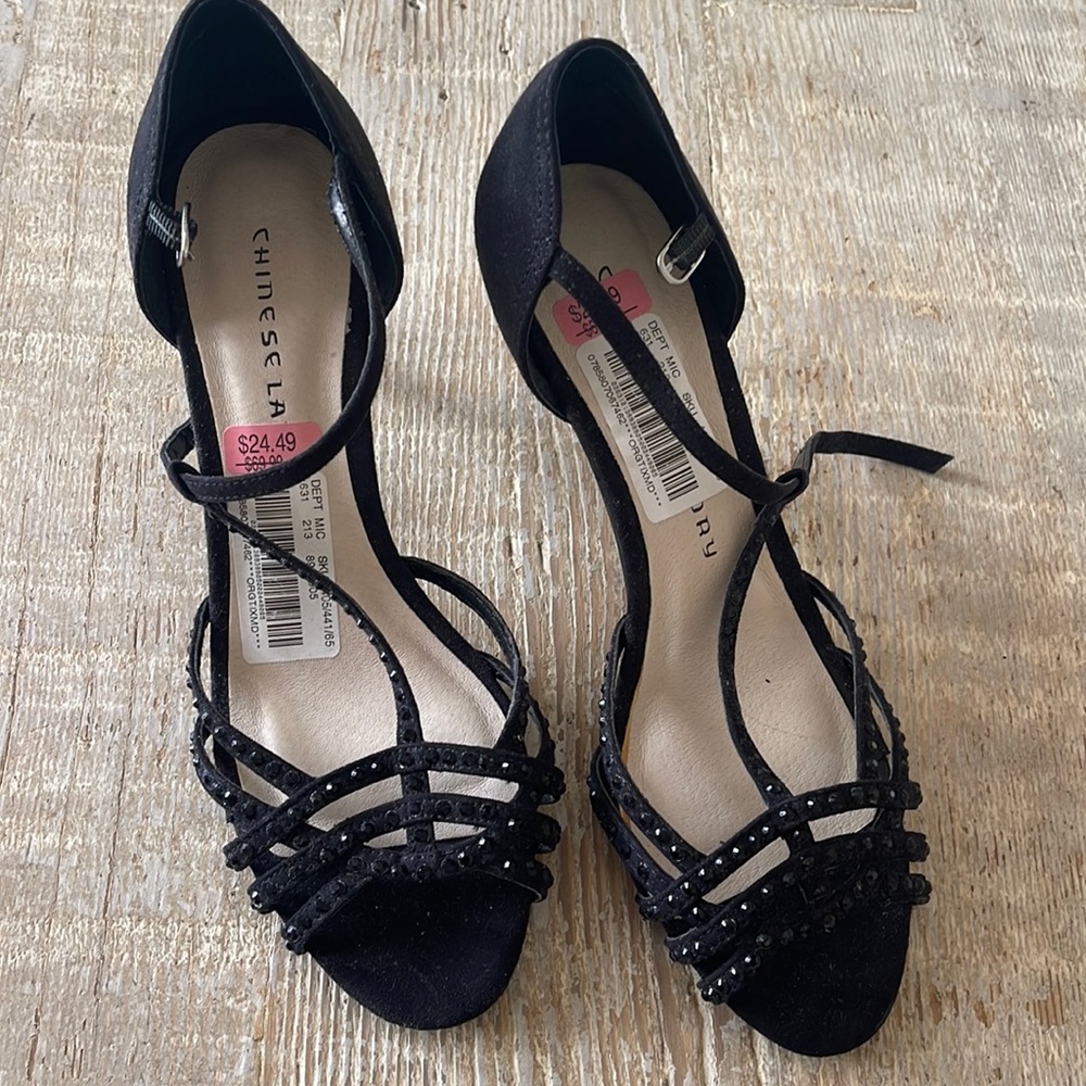 Brand new never worn size 7 black evening shoes w/ 3”heel. My loss is your gain!
